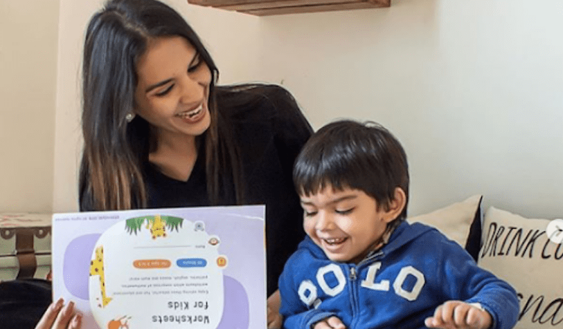 Reading a short story to my son to ensure child's overall growth 